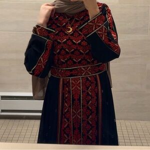 Red embroidered thobe